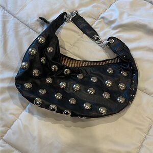 Elegant Black Hobo Bag with Silver Accents